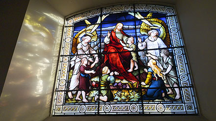 Stained Glass Window of Jesus with Angels and Children.